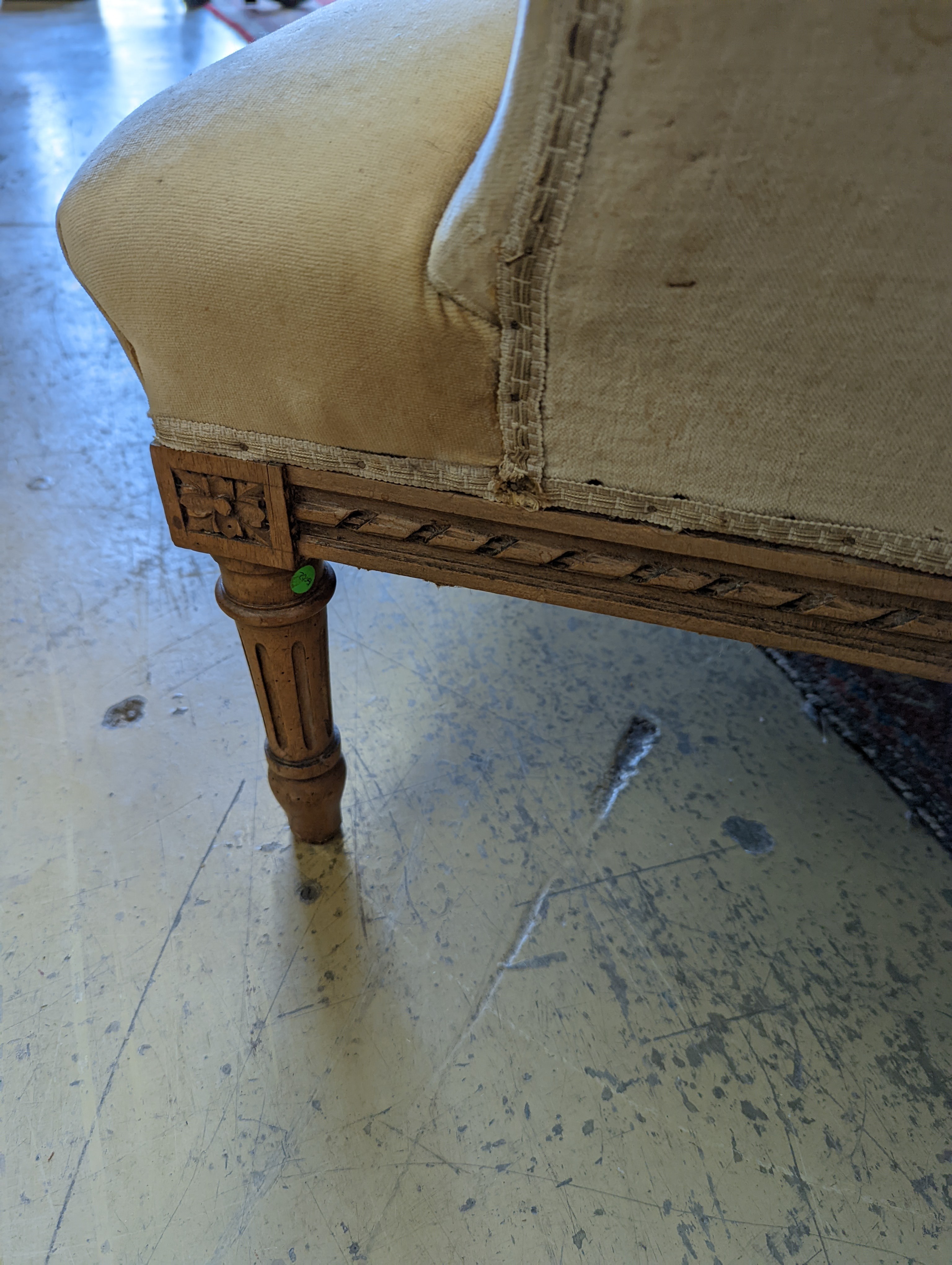 A late 19th century French carved beech armchair